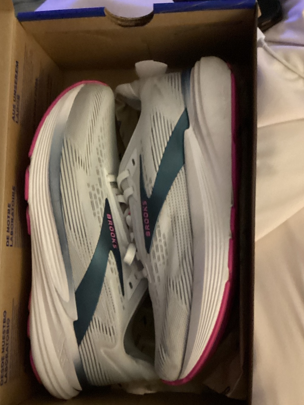 Brooks Women’s White Running Shoes with Teal and Pink Accents